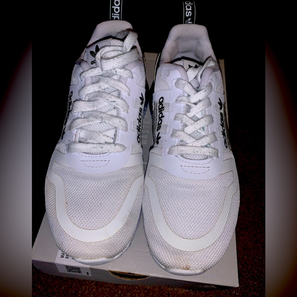 Gently used boys black and white Adidas X Speed Portal.3 size 3.